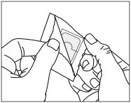 Two hands carefully holding and opening a medication pouch to remove its internal contents