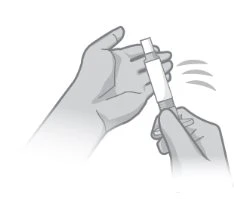 Two hands holding a cylindrical medical device and shaking it with a quick motion downward