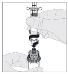 A hand holding a syringe and inserting it with a clockwise rotating motion into a medical device