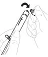A hand holds an injection pen while the