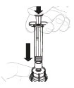 A hand pressing the top button of a syringe downward with a black arrow indicating movement toward the base of the device