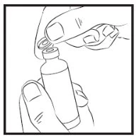One hand holds a glass vial steady while the