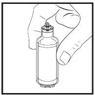 One hand holds vertically a cylindrical drug vial with cap and rounded base for administration