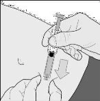 A hand holds a syringe to inject medication while the other stabilizes the injection site