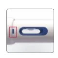 Close-up of a white medical device with a blue oval window and a small vertical indicator enclosed in a red rectangle