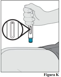 A hand holds a medical device with a magnified view showing a transparent viewing window above the blue tip