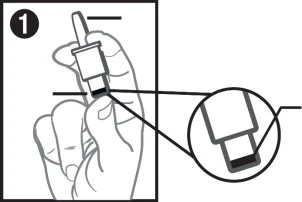 Technical drawing of a hand holding a medical device with a circular magnified inset showing the detail of the dark tip