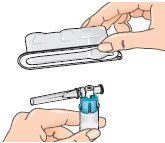 One hand removes the protective cap from a medical device while the other stabilizes it