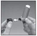 Two hands showing how to attach a black cap onto a cylindrical medical device indicated by a white arrow