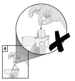 Technical drawing showing a hand inserting a needle into a medical device, with a large black cross indicating the