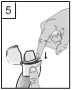 A hand holds an open container while the
