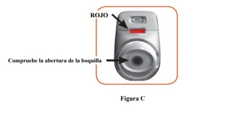 Medical device with a red indicator on top and an arrow pointing to the