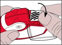 Two hands holding a red and white medical device while a black arrow indicates a downward twisting motion