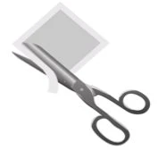 A pair of open scissors with metallic blades cutting a tilted white sheet of paper against a neutral background