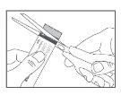 Two hands using scissors to cut the top off a cylindrical medication or medical device package
