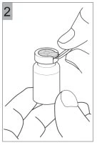 One hand holds a glass vial while another