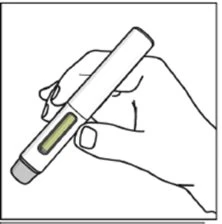 A hand holding a white injection pen with a transparent window showing the liquid inside
