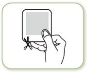 Black and white drawing of a hand holding a square package while a pair of scissors cuts it open