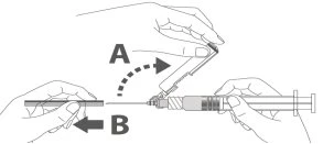 Technical drawing showing two hands separating a needle from a syringe through a pulling motion indicated by letters A and B
