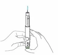 Two hands holding a medical injection pen vertically with a small blue liquid droplet emerging from the tip