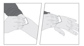 Two schematic drawings show hands applying a white adhesive dressing onto a person's arm to cover an area of skin