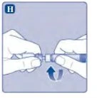 Due mani tengono una penna iniettiva per ruotare la parte superiore con una freccia blu curva che indica il movimento di rotazione