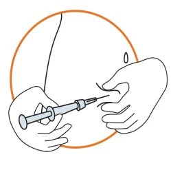 Due mani tengono una siringa per iniettare un farmaco nella parte inferiore dell