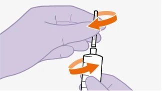 Una mano tiene una siringa mentre l'altra guida il movimento