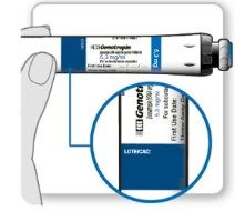 A hand holding a Genotropin injection pen with a magnified view showing detail of the