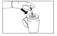 A hand holding a syringe inserting it vertically into the