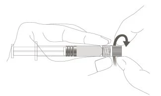 Two hands holding a syringe horizontally while a curved arrow indicates rotating the end cap to the right