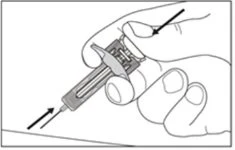 A hand holding a syringe with two black arrows indicating thumb pressure on the plunger and the direction of injection