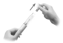 Two hands removing a protective cap from a medical injection pen with an arrow indicating the motion away from the device