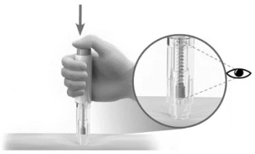A hand holding a medical device for subcutaneous injection