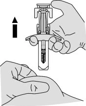 A hand holding a syringe-shaped medical device