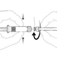 Two hands holding the two components of a syringe, ready to be joined by twisting them together