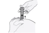 One hand holding a vertical injection pen above the skin while the