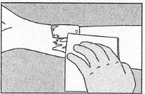 A hand cleaning the skin of the arm with a rectangular wipe or gauze prior to a