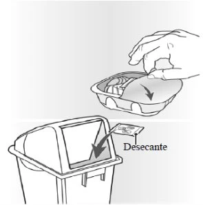A hand lifts the lid of a container to insert a desiccant packet into a waste disposal container