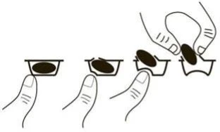 Schematic drawing showing four stages for removing a tablet from a blister pack using the