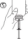 A hand gripping a glass vial while with the