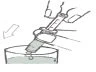 Technical drawing showing a hand tilting a syringe to draw liquid from a transparent container with a directional arrow