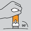A hand holding an orange and white medical device, positioning it vertically on the skin at a 90-degree angle