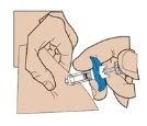 Two hands holding a syringe with a blue device to inject a drug into the skin of the arm or thigh