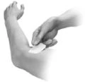 A hand applying a white patch to the upper arm of a person in a black and white illustration