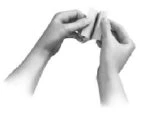 Two hands gently holding and bending a small cylindrical object or medicine tube against a white background