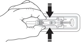 A hand holds a horizontal medical device while two black arrows indicate downward and inward pressure