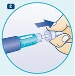 A hand pushes down the cap of a syringe following the direction of a blue arrow to engage the device