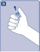 A hand holding a small glass vial toward the viewer