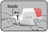 Due mani tengono un dispositivo medico bianco con una parte rossa mentre una freccia nera indica l'azionamento